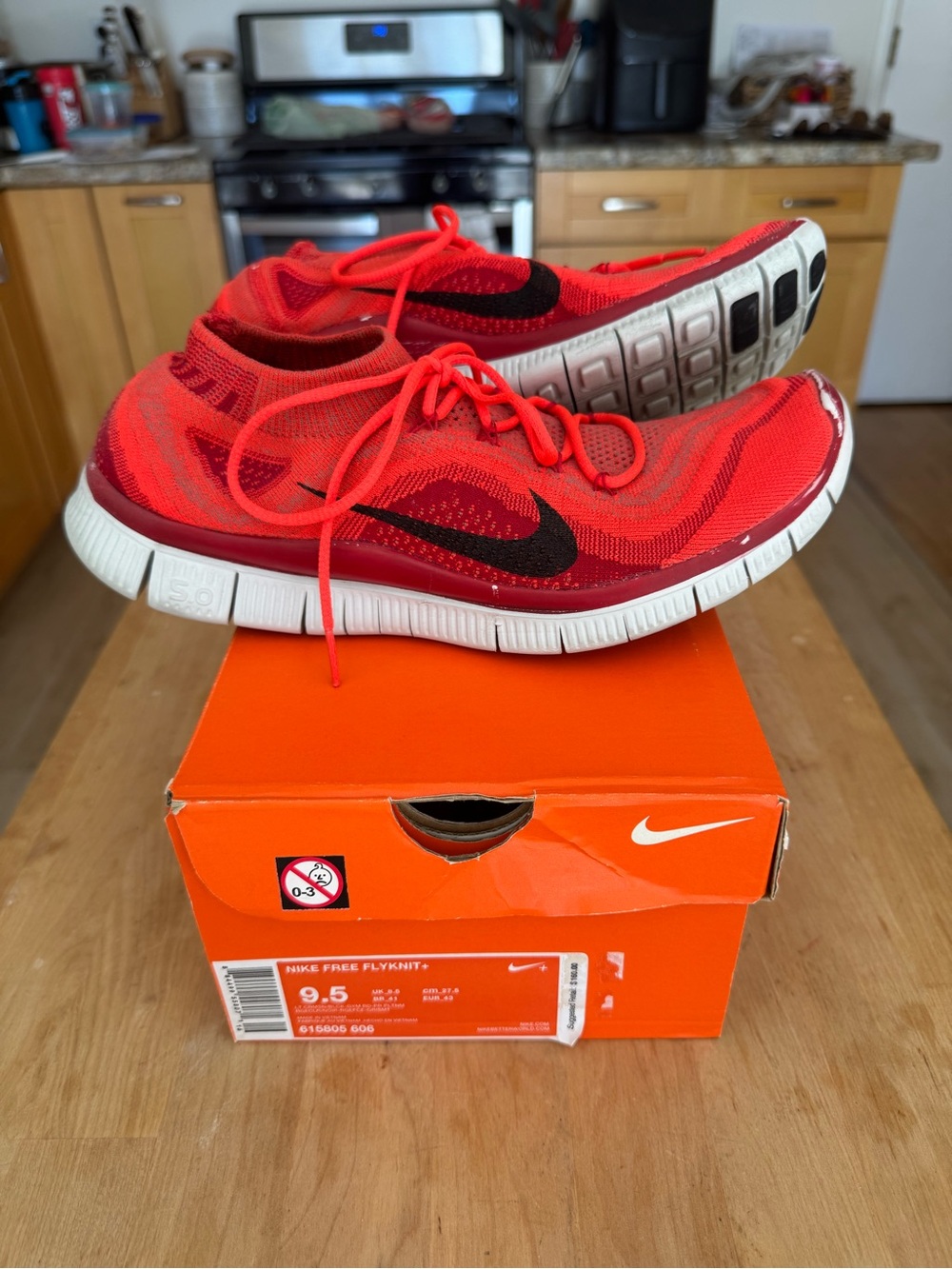 Nike Kids Red and Black Flyknit Sneakers